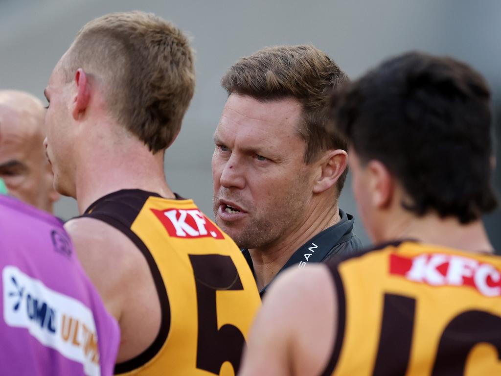 PERTH, AUSTRALIA - JUNE 30: Sam Mitchell, Senior Coach of the Hawks addresses the team at the quarter time break during the 2024 AFL Round 16 match between the West Coast Eagles and the Hawthorn Hawks at Optus Stadium on June 30, 2024 in Perth, Australia. (Photo by Will Russell/AFL Photos via Getty Images)