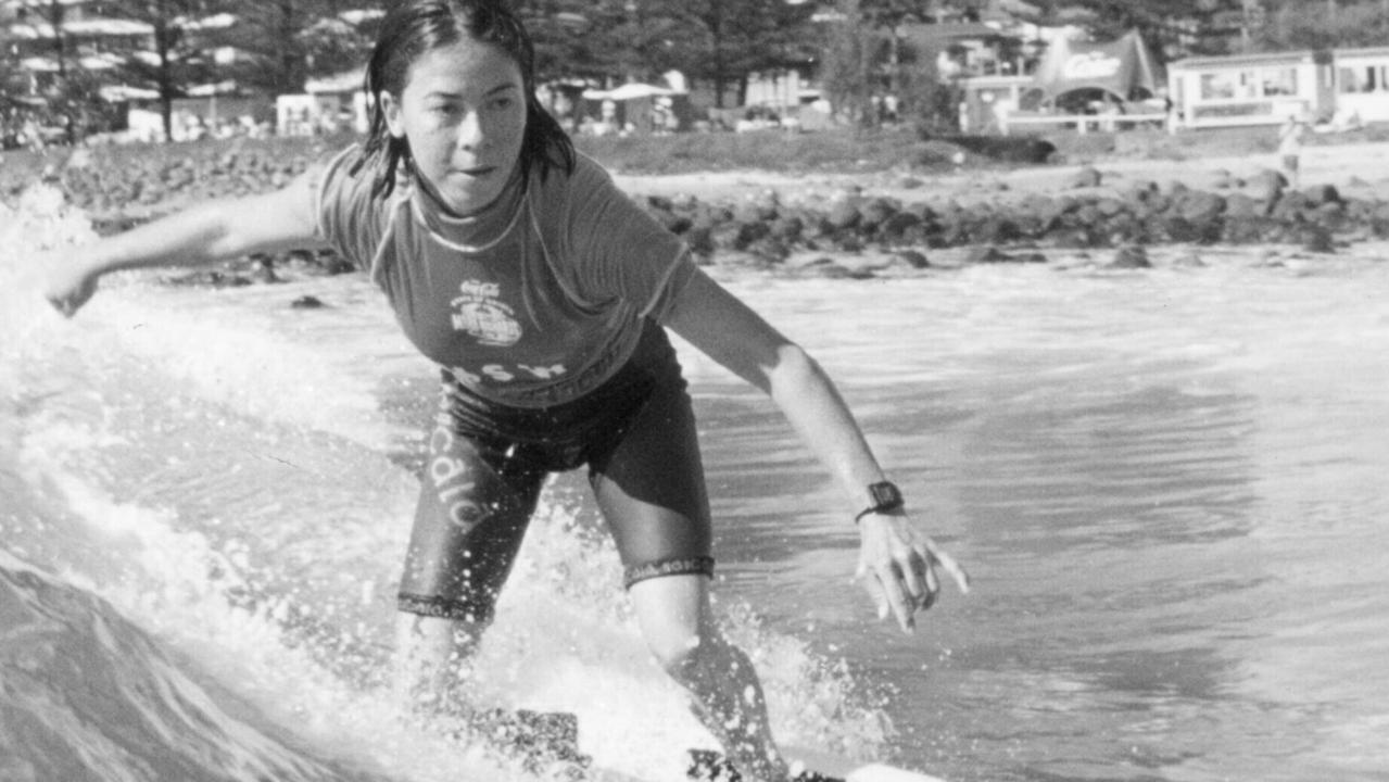 Pauline Menczer surfing at Burleigh Heads on the Gold Coast in 1996.