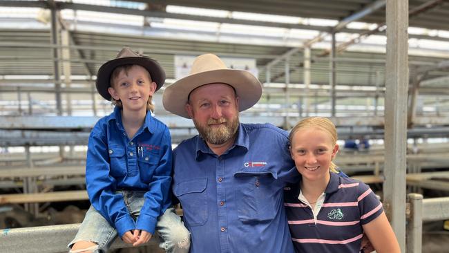 Alex Craddock, 9, father Daniel Craddock, Corcoran Parker Mansfield, and Tara Craddock, 12, at the Wodonga feature female sale. Mr Craddock bought PTIC Angus heifers and paid up to $2540 for a pen which weighed 585kg, was two years old and Banquet blood.