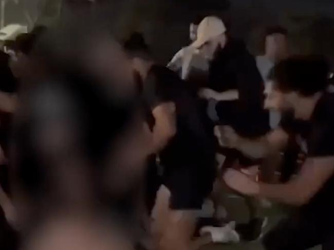 **BLURRED VERSION** Still of video showing a man being stabbed during a brawl in Guildford on New Year's Eve, Sydney, 31 December 2024. Picture: Supplied