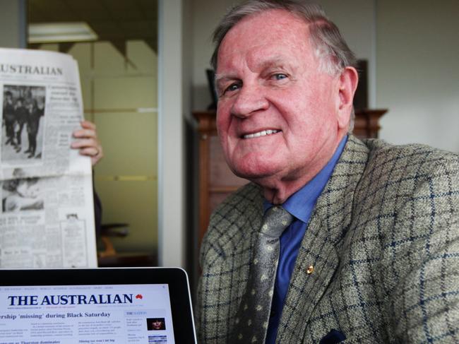 Former News Limited executive Ken Cowley, now RM Williams chairman, who was instumential in starting their national newspaper The Australian, with a copy of the first edition of the newspaper and the first ever online edition on new Apple iPad application to be launched tomorrow, in his office in Sydney.