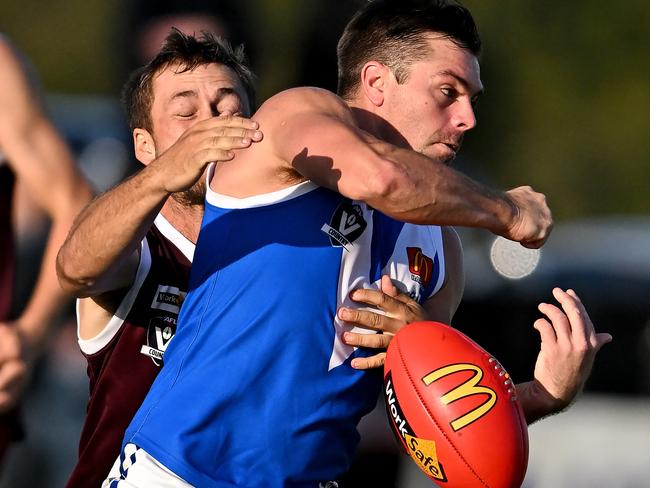 MeltonÃs #1 and SunburyÃs #9 during the BFL Melton v Sunbury football match in Toolern Vale, Saturday, April 23, 2022. Picture: Andy Brownbill