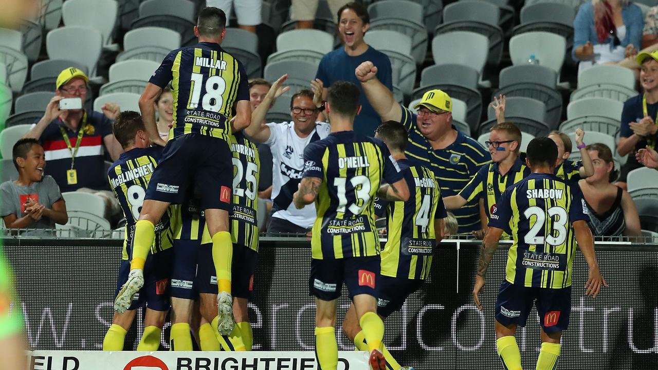 Central Coast Mariners players celebrate. (Photo by Tony Feder/Getty Images)