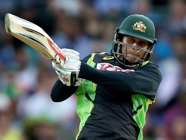 Australia's Usman Khawaja hits a boundary during the T20 international between Australia and India at the SCG .Picture Gregg Porteous