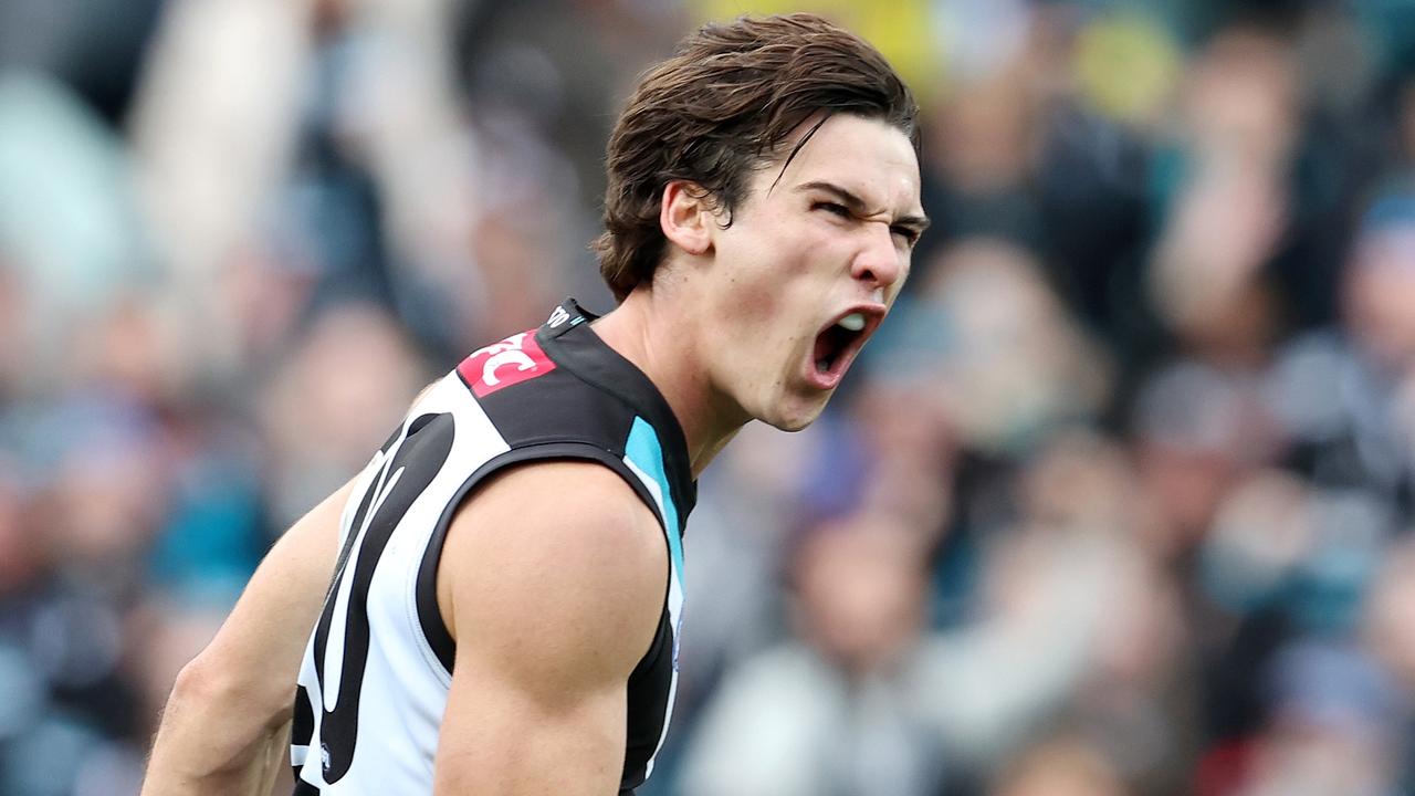 Connor Rozee celebrates a big final-quarter goal for the Power. Picture: Sarah Reed/AFL Photos via Getty Images