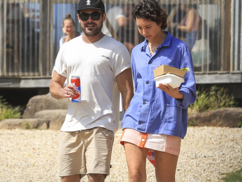 Zac Efron and Aussie girlfriend Vanessa Valladares hold hands on a lunch outing in Byron Bay. Picture: Media-Mode.com