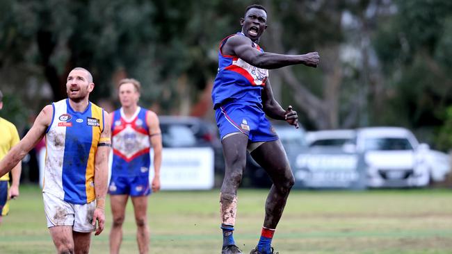Majak Daw now plays for North Heidelberg. He was pictured celebrating a goal for the team on Saturday, May 6, at a game against Macleod in Heidelberg Heights. Picture: Hamish Blair