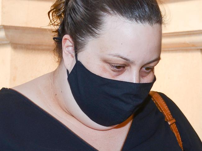 ADELAIDE, AUSTRALIA - NewsWire Photos SEPTEMBER 15, 2021: Riverland teacher Renee Underwood leaves the District Court where she is facing charges of making a child amenable to sexual contact. Picture: NCA NewsWire /Brenton Edwards