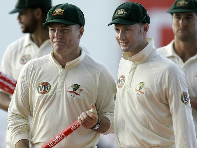 Stuart MacGill leaves the field alongside Michael Clarke after playing his final Test.