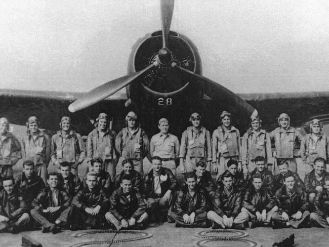 JUNE 26, 1945 : Pilots and crw of Torpedo Bomber 28 at Fort Lauderdale Naval Air Station in 26/06/45 file photo, sit in front of the lead plane of Flight 19, known as "Lost Squadron", which vanished 05/12/45 off the coast of Florida, with airmen in this photo are not those who vanished on a Navy mission that began the myth of the Bermuda Triangle, is still unexplained but not forgotten 60 years later. Historical USA / Armed Forces / Navy / Aircraft