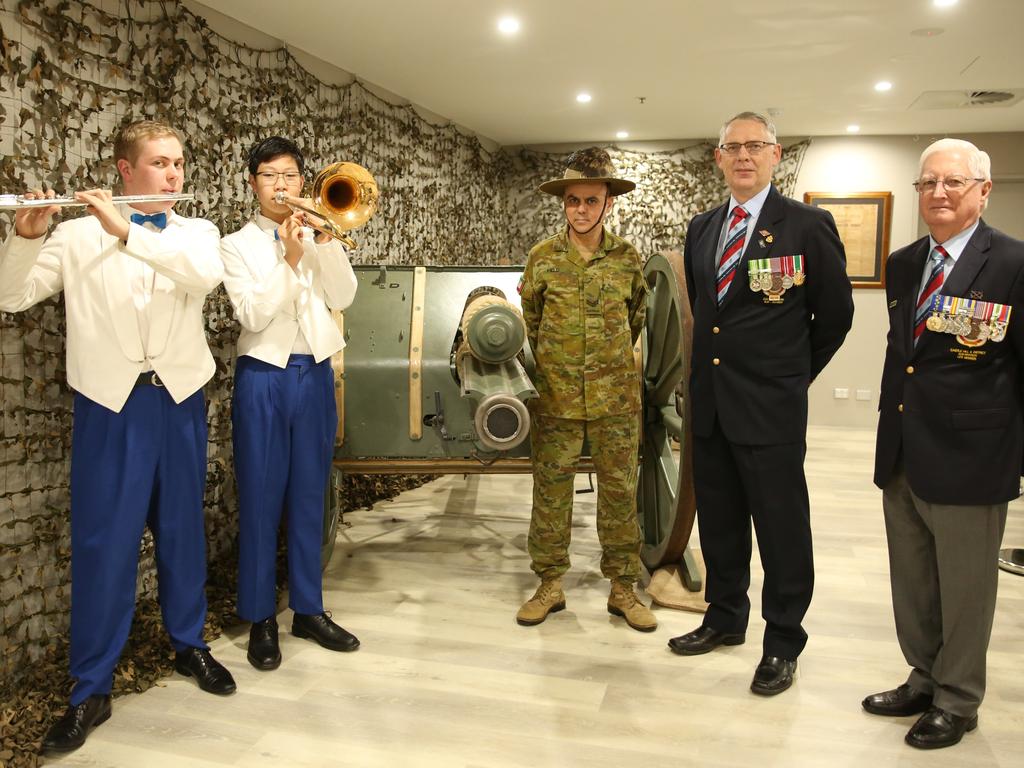 Castle Hill RSL Pipe Band members Mitchell Togher and Marcus Chan with Cpl Terry Field, and Don Tait and David Hand from the Mitchell Centenary of Armistice Committee.