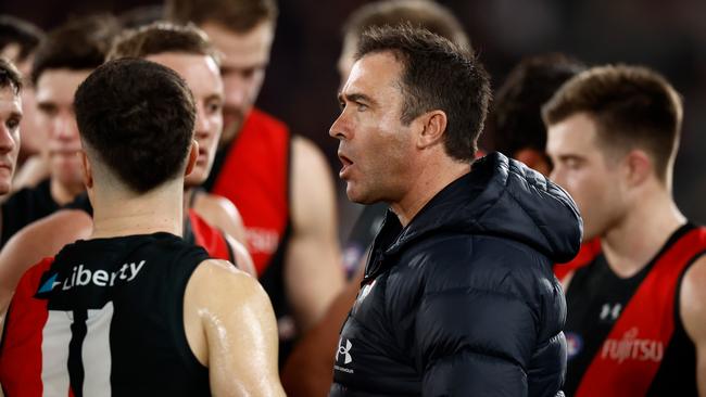 MELBOURNE, AUSTRALIA - AUGUST 10: Brad Scott, Senior Coach of the Bombers addresses his players during the 2024 AFL Round 22 match between the Essendon Bombers and the Gold Coast SUNS at Marvel Stadium on August 10, 2024 in Melbourne, Australia. (Photo by Michael Willson/AFL Photos via Getty Images)