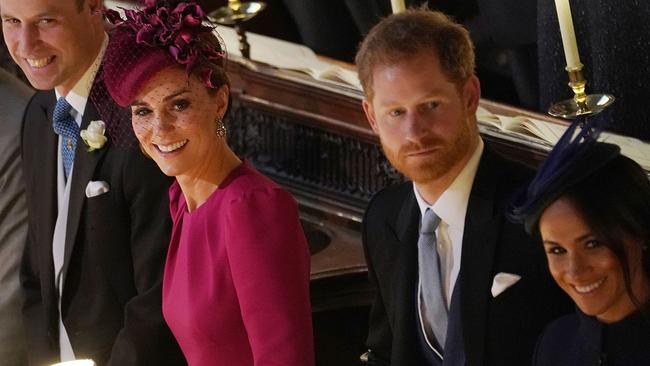 The four were all smiles at Princess Eugenie’s wedding. Picture: AFP