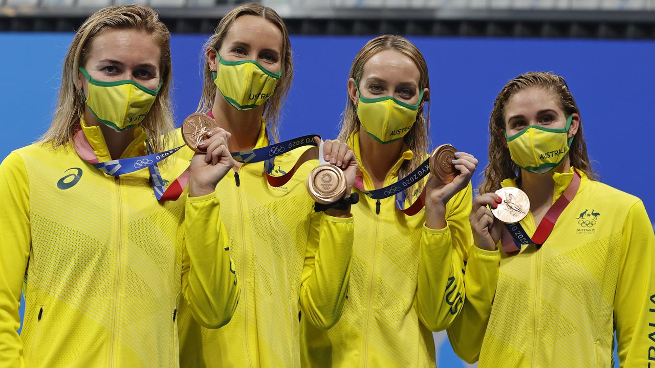 The 4x200m freestyle team with their bronze medals. Picture: Alex Coppel