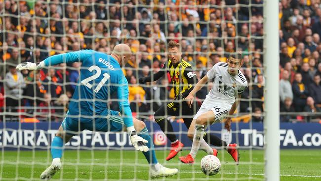 Watford’s Gerard Deulofeu, centre, beats Wolverhampton goalkeeper John Ruddy to score the winner in their FA Cup semi-final. Picture: Getty Images