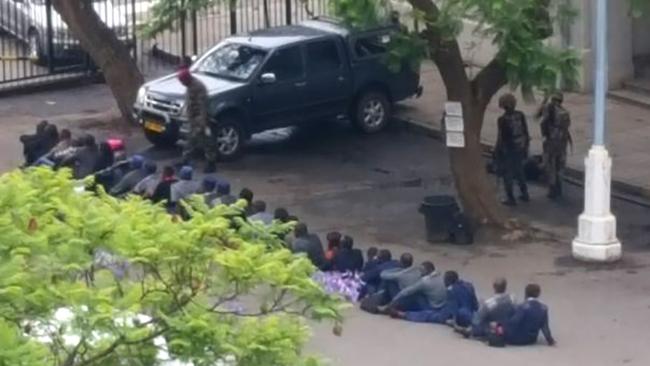 Security officers detained in Harare. Picture: AFP