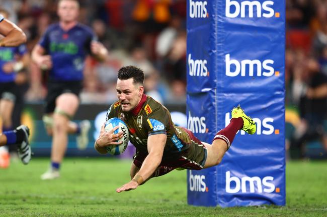 Lachie Anderson of the Reds scores a try during the round 11 Super Rugby Pacific match between Queensland Reds and Blues at Suncorp Stadium, on April 25, 2025, in Brisbane, Australia. (Photo by Chris Hyde/Getty Images)