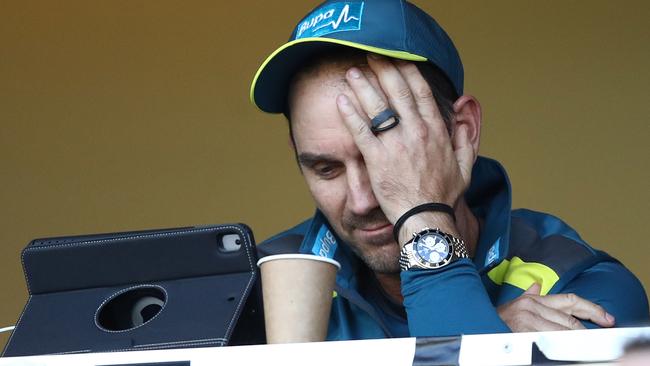 Justin Langer watches on as Australia bats against South Africa.