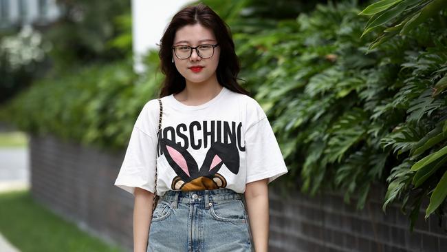 Chinese student Jennie Jia outside the Atira building. Students were moved to a nearby building owned by Scape to make way for the homeless people. Picture: AAP/Jono Searle