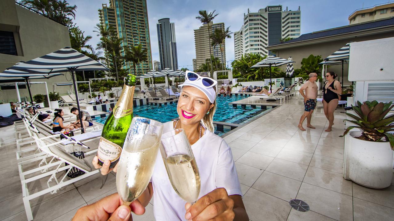 QT Hotel Surfers Paradise staff member Caroline Francato is looking forward to more bookings at the hotel after Brisbane’s lockdown was lifted on Monday. Picture: Nigel Hallett.