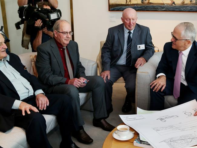 PM Malcolm Turnbull met with former Snowy Hydro workers earlier this year at Parliament House in Canberra. Picture Kym Smith