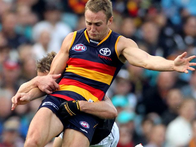 AFL football - Adelaide Crows vs Port Adelaide Power Showdown XXXII match at AAMI Stadium. Footballer Brent Reilly and Jay Schulz.