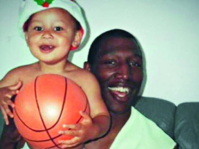 Ben Simmons as a baby with his father Dave.