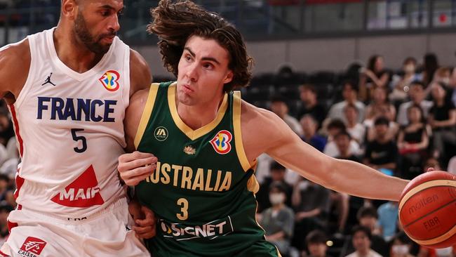 TOKYO, JAPAN - AUGUST 20: Josh Giddey #3 of Australia drives against Nicolas Batum #5 of France during the international basketball game between France and Australia at Ariake Arena on August 20, 2023 in Tokyo, Japan. (Photo by Takashi Aoyama/Getty Images)