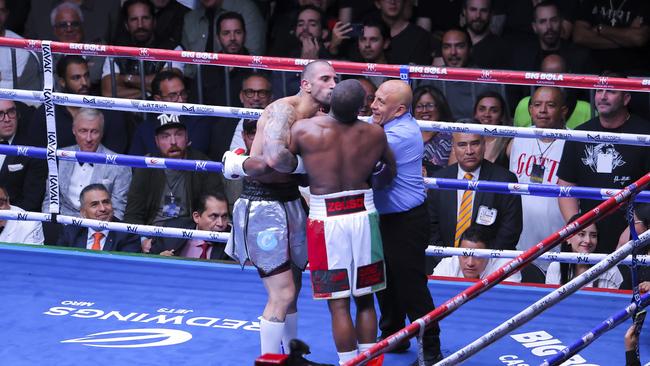 Gotti also tried to kiss Mayweather. Photo by Agustin Cuevas/Getty Images