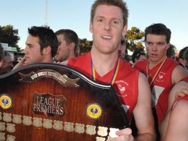 Clint Girardi celebrates a premiership for Ramblers. Picture: Supplied