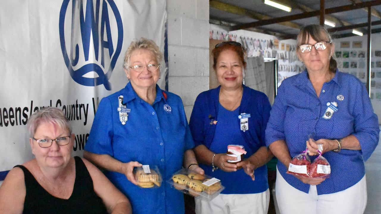 Bowen CWA new recruit Sharon Wright, president Eileen Crouch, and members Cynthia Prothero and Lyn Danvers at the very popular Bowen Show cake stall. Picture: Kirra Grimes