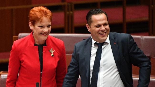 One Nation Senators Pauline Hanson and Peter Georgiou after the Income Tax vote in the Senate Chamber at Parliament House in Canberra, Thursday, June 21, 2018. (AAP Image/Mick Tsikas) NO ARCHIVING