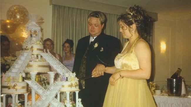 Carl Williams and a pregnant Roberta at their wedding in January 2001. Picture: Big Shots/Adam Shand/Penguin books.