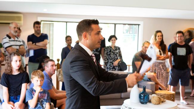 Auctioneer Vic Lorusso in action at an Elanora Heights, NSW property. Picture: AAP