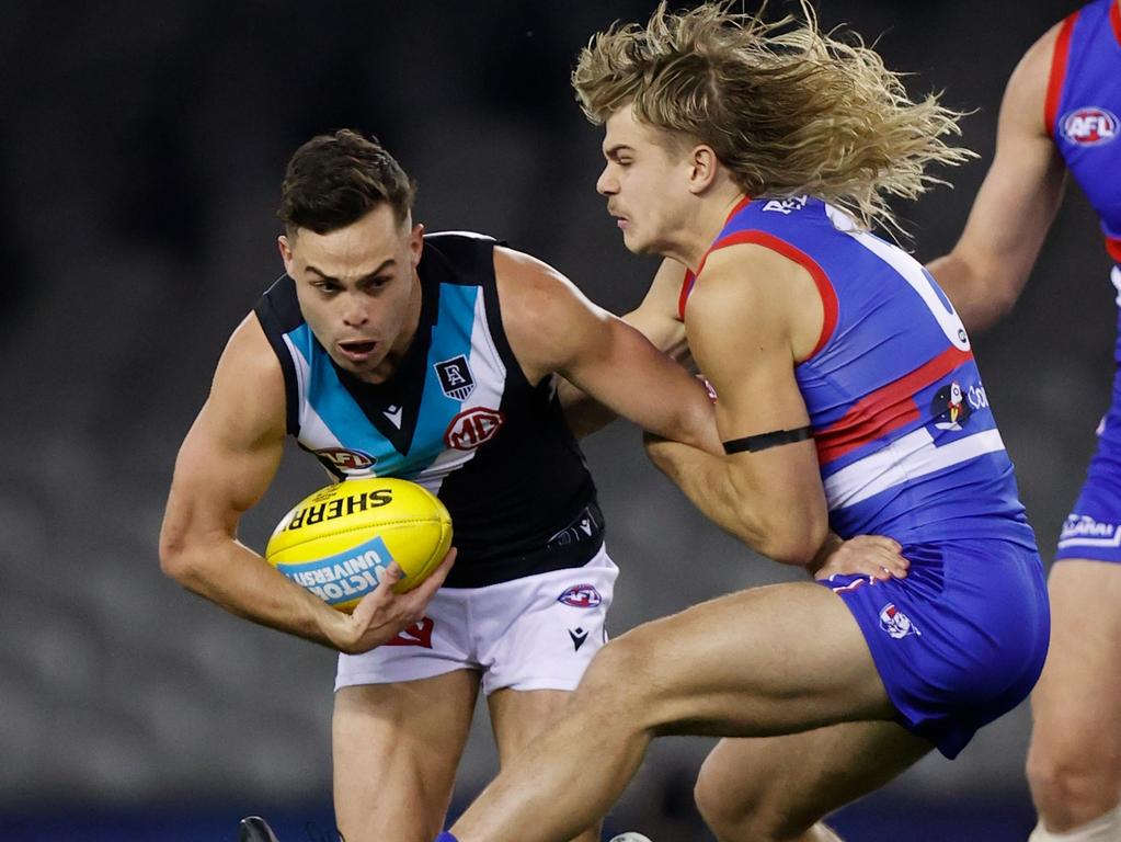 Karl Amon (L) played his 100th AFL game on Friday night, while Port Adelaide mastermind Ken Hinkley coached his 200th. (Photo by Michael Willson/AFL Photos via Getty Images)