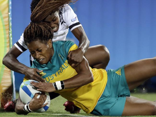 Ellia Green scores a try.
