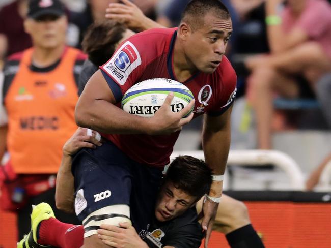 Caleb Timu bulldozes through the Jaguares defence.