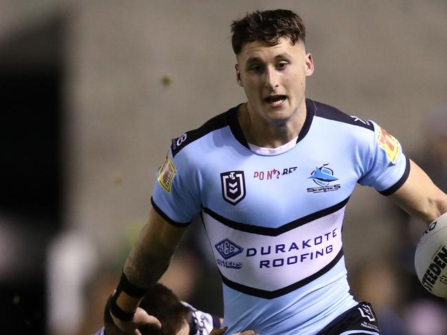 Cronulla's Bronson Xerri and Cowboy's Tom Opacic during NRL match between the Cronulla Sharks and North Queensland Cowboys at Pointsbet Stadium. Picture. Phil Hillyard