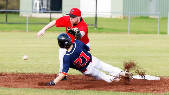 A Bellarine Bears player slides in against the East Belmont Saints. Picture: Mark Lazarus.