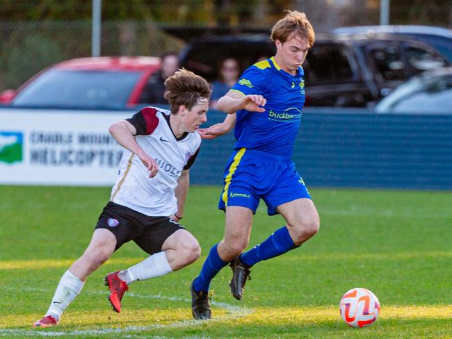 South Hobart's Jordan Fidra and Devonport's Charles Bidwell do battle during the NPL grand final. Picture: Solstice Digital