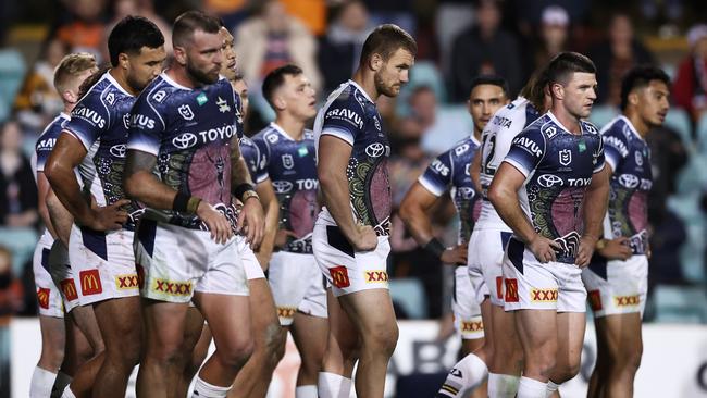 Cowboys players look dejected after a Tigers try during the66-18 rout. (Photo by Matt King/Getty Images)