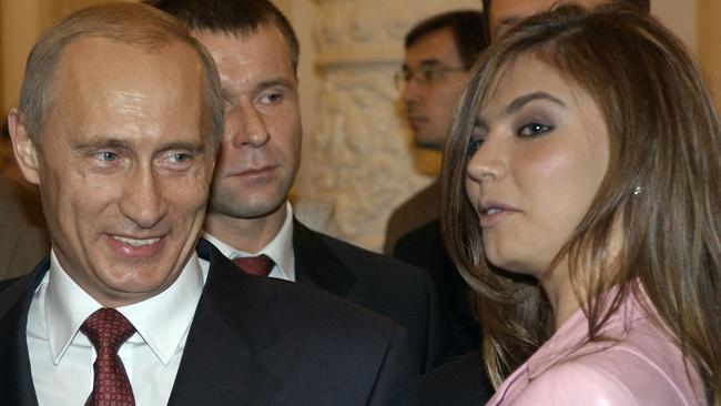 Vladimir Putin and Olympic champion Alina Kabaeva. Picture: TASS via Getty Images