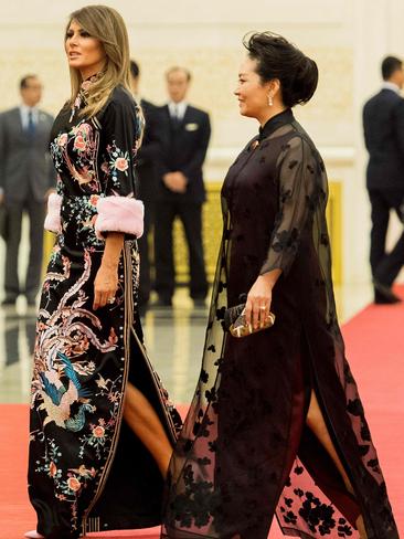 NOVEMBER 9: A Chinese-inspired, floor-length Gucci gown ensured Melania turned heads as she joined Peng Liyuan, wife of China’s President Xi Jinping, for a state dinner at the Great Hall of the People in Beijing. Picture: AFP