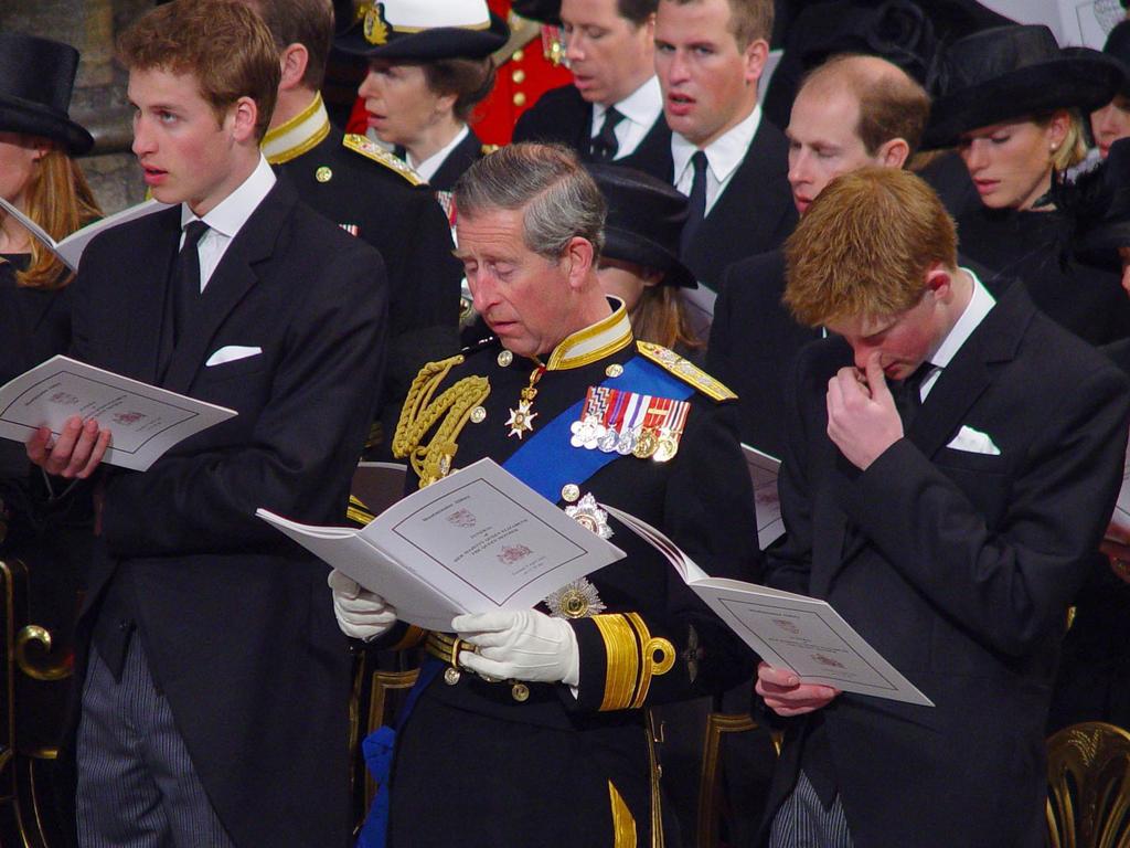 <b>2002:</b> Prince Harry and Prince William attend the funeral of their great-grandmother, the Queen Mother, after her death at the age of 101. Harry will receive a sizeable from the Queen Mother when he turns 40.