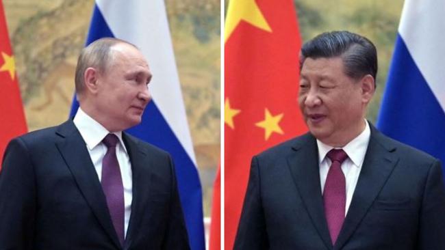 Russian President Vladimir Putin (L) and Chinese President Xi Jinping pose for a photograph during their meeting in Beijing, on February 4, 2022. Picture: Alexei Druzhinin / Sputnik / AFP