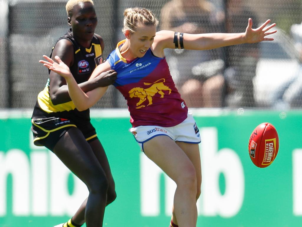 Richmond’s Akec Makur Chuot and Lions’ Lauren Arnell compete for the ball during the 2021 season. Picture: Michael Willson/AFL Photos via Getty Images