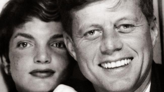 John F. Kennedy with Jacqueline Kennedy Onassis.