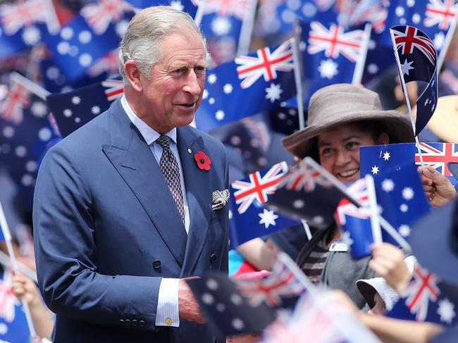 ADELAIDE, AUSTRALIA - NOVEMBER 07: Prince Charles, Prince of Wales is greeted by school children during a visit to Kilkenny Primary School on November 7, 2012 in Adelaide, Australia. The Royal couple are in Australia on the second leg of a Diamond Jubilee Tour taking in Papua New Guinea, Australia and New Zealand. (Photo by Morne de Klerk/Getty Images)