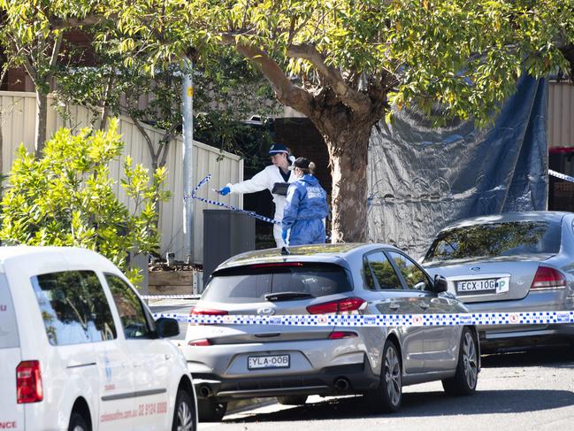 Police at the scene of Iskander’s home where he was shot dead. Picture: Monique Harmer