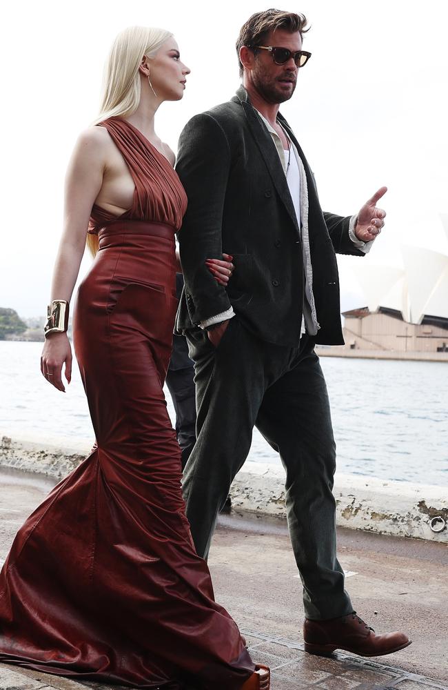 The glamarous pair walked arm-in-arm as they headed toward the premiere. Photo by Brendon Thorne/Getty Images.